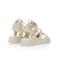 Flatforms μπεζ δερματίνη με ιδιαίτερο δέσιμο