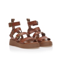 Flatforms κάμελ δερματίνη με λουράκι στον αστράγαλο