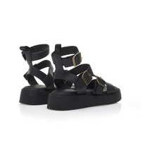 Flatforms μαύρα δερματίνη με λουράκι στον αστράγαλο