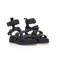 Flatforms μαύρα δερματίνη με λουράκι στον αστράγαλο