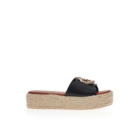 Flatforms μαύρα δερματίνη με διακοσμητική αγκράφα στη φάσα
